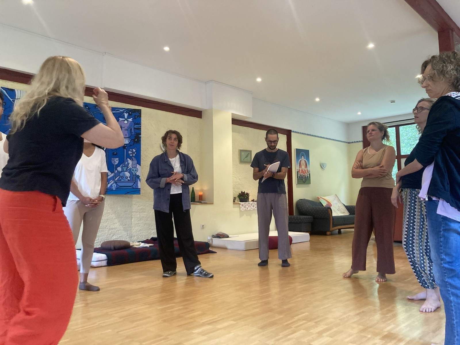 Group standing together in a learning circle