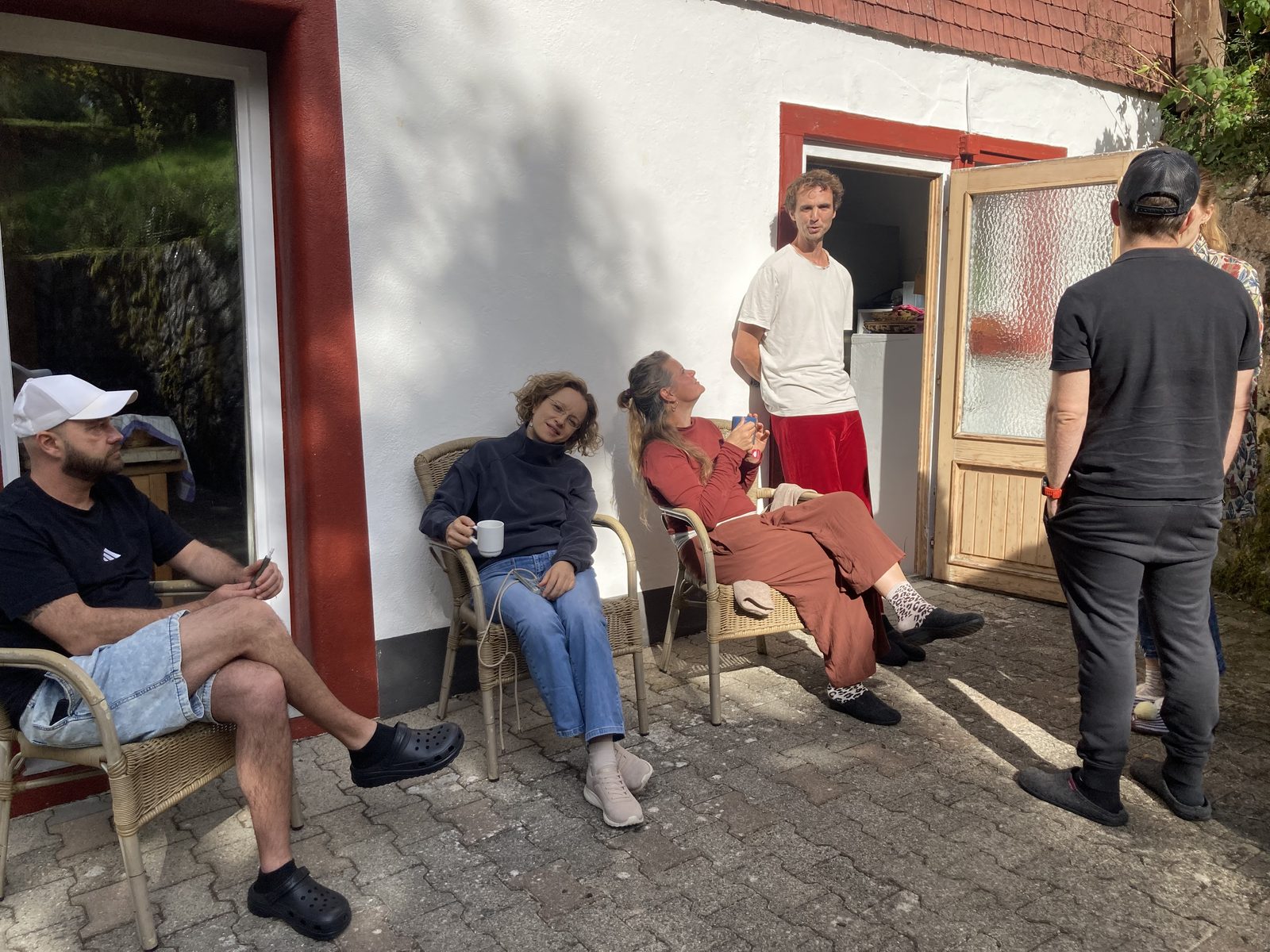 Resting in the sun outside the seminar house