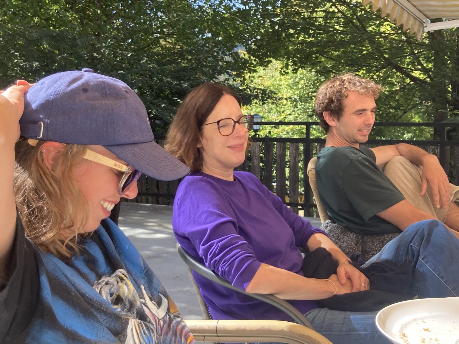 Smiles and conversation on the terrace