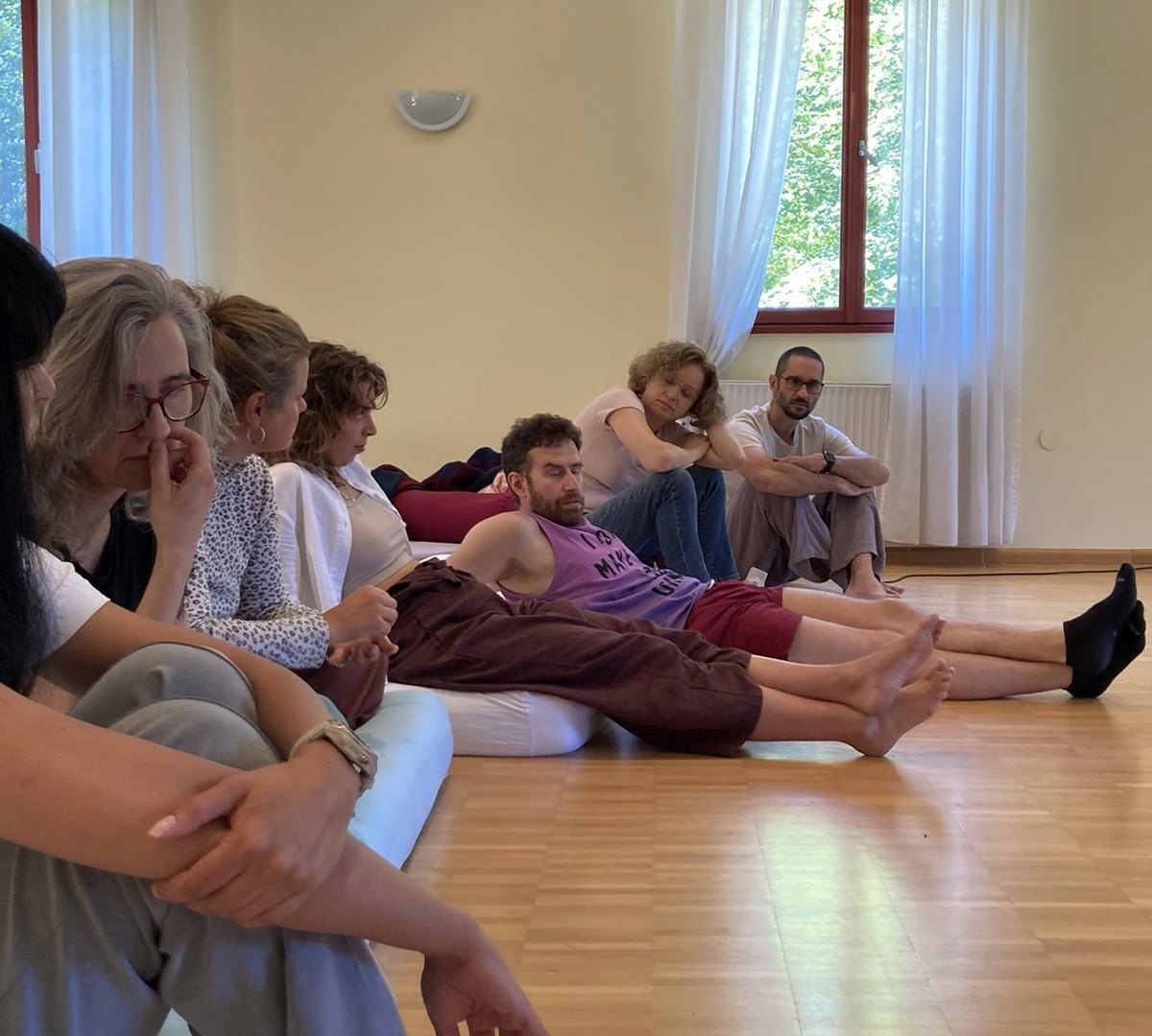 Group seated and listening during a lecture