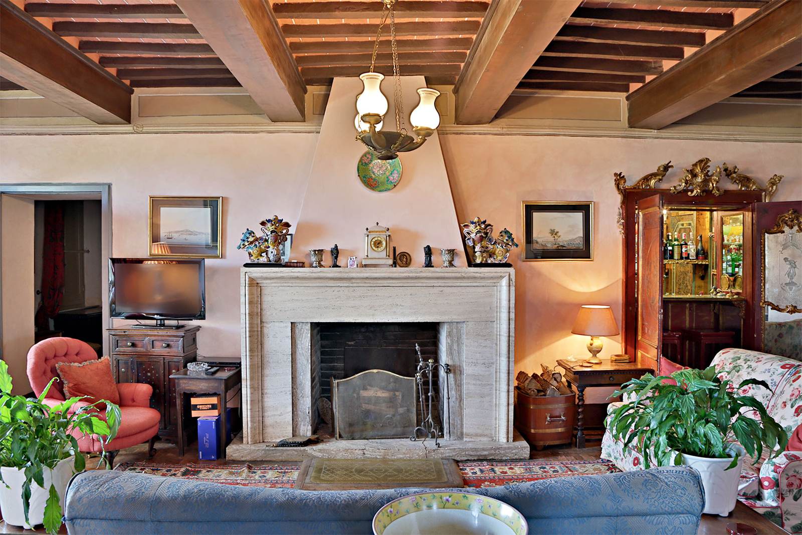 Living room with a stone fireplace